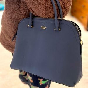 Kate Spade purse NWOT. It’s been sat in closet never used - needs loving home